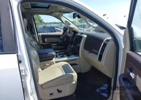 2015 Ram 1500 Laramie z USA, uszkodzony, nr VIN 1C6RR7NT1FS597527